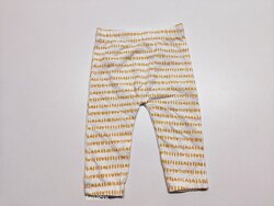 Bílé kalhoty se srdíčky pro holky secondhand Bílé kalhoty se srdíčky pro holky secondhand