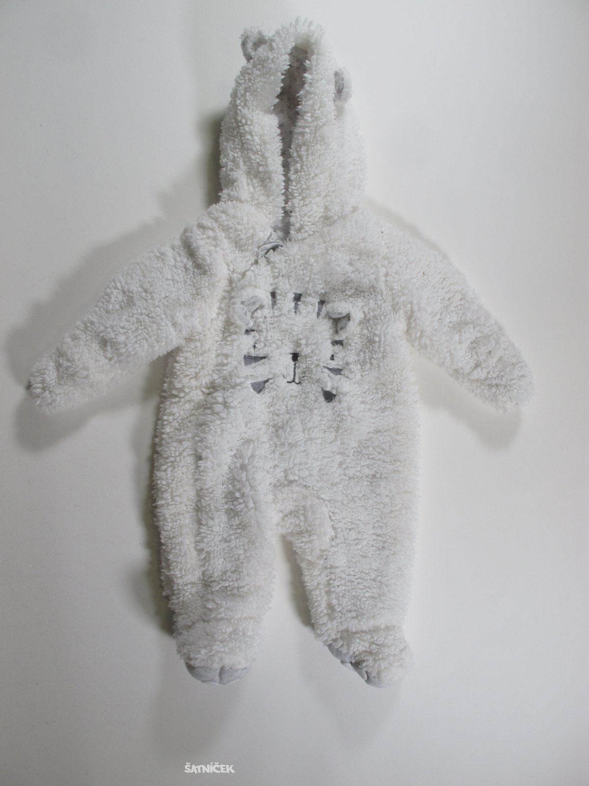 Přechodová kombinéza bílá secondhand