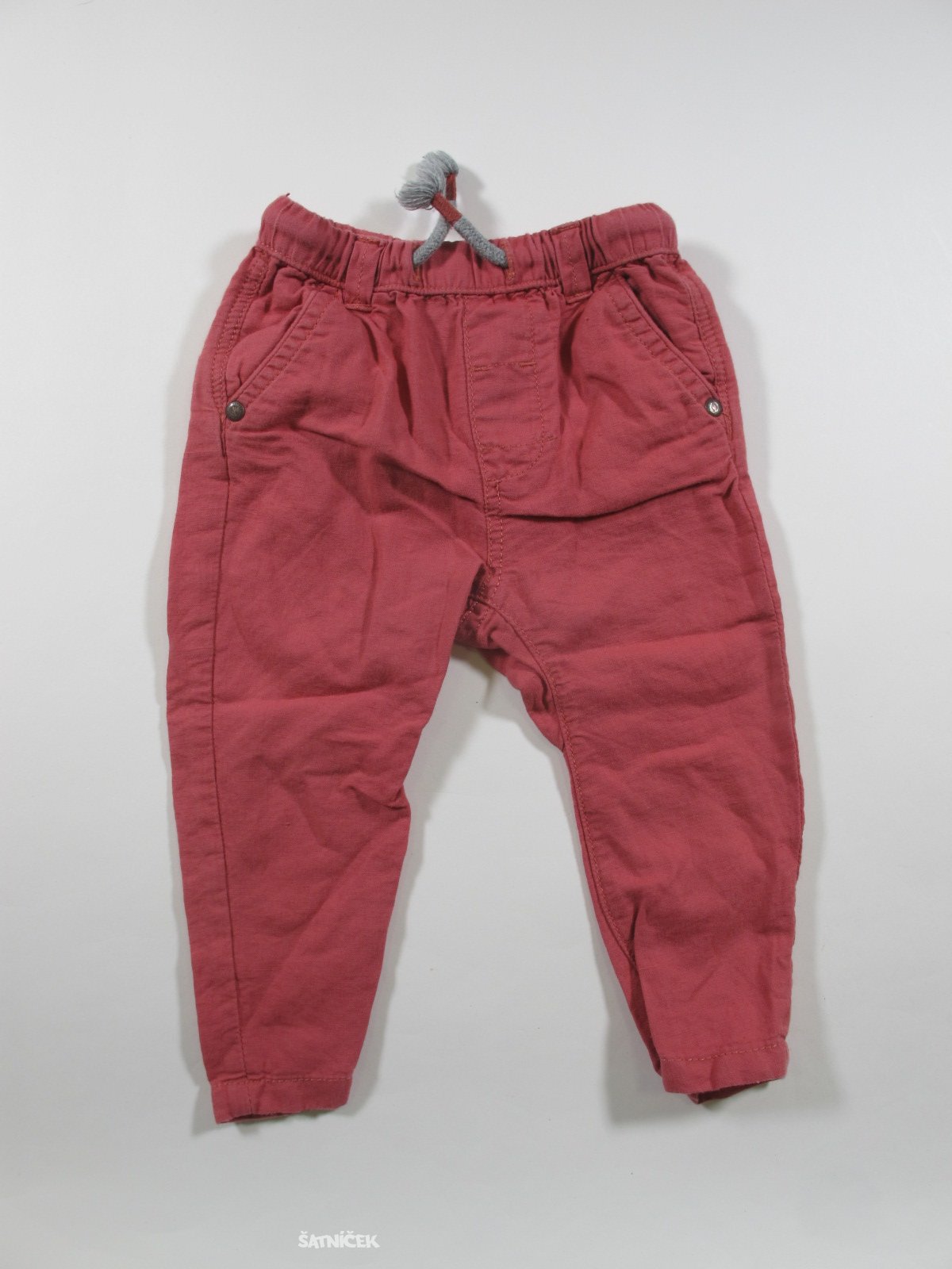 Korálové plátěné kalhoty  pro kluky secondhand